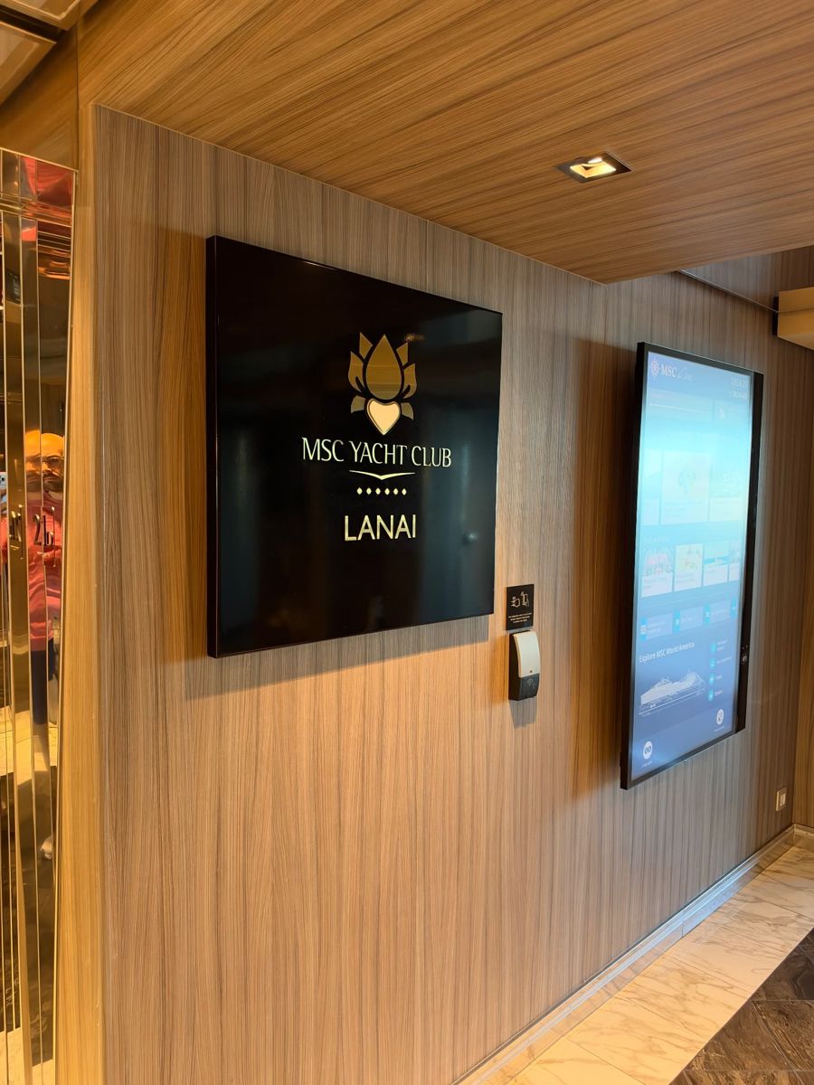 MSC Yacht Club Lanai entrance sign in Chris’s onboard photograph